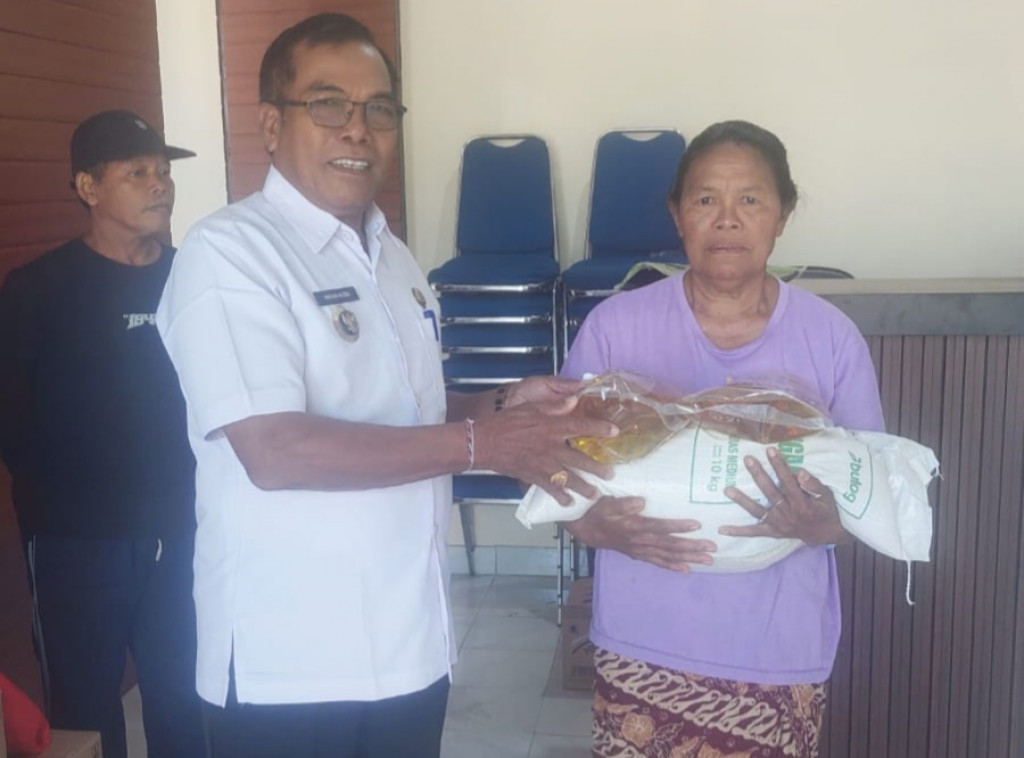 Pendistribusian Bantuan Pangan Beras dan Minyak Goreng Tahap I Periode bulan Februari dan Maret Tahun 2026 di Desa Baha