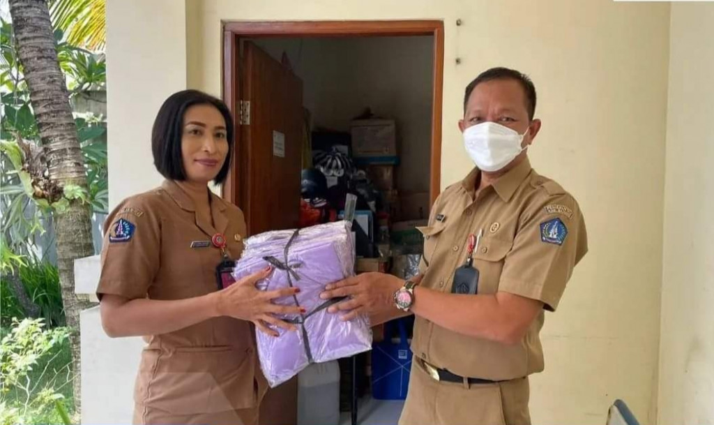 BANTUAN BAJU KADER