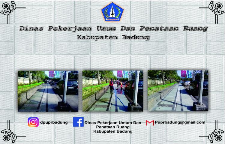 penyemprotan trotoar di ruass jalan rayakuta-legian.kecamatan kuta
